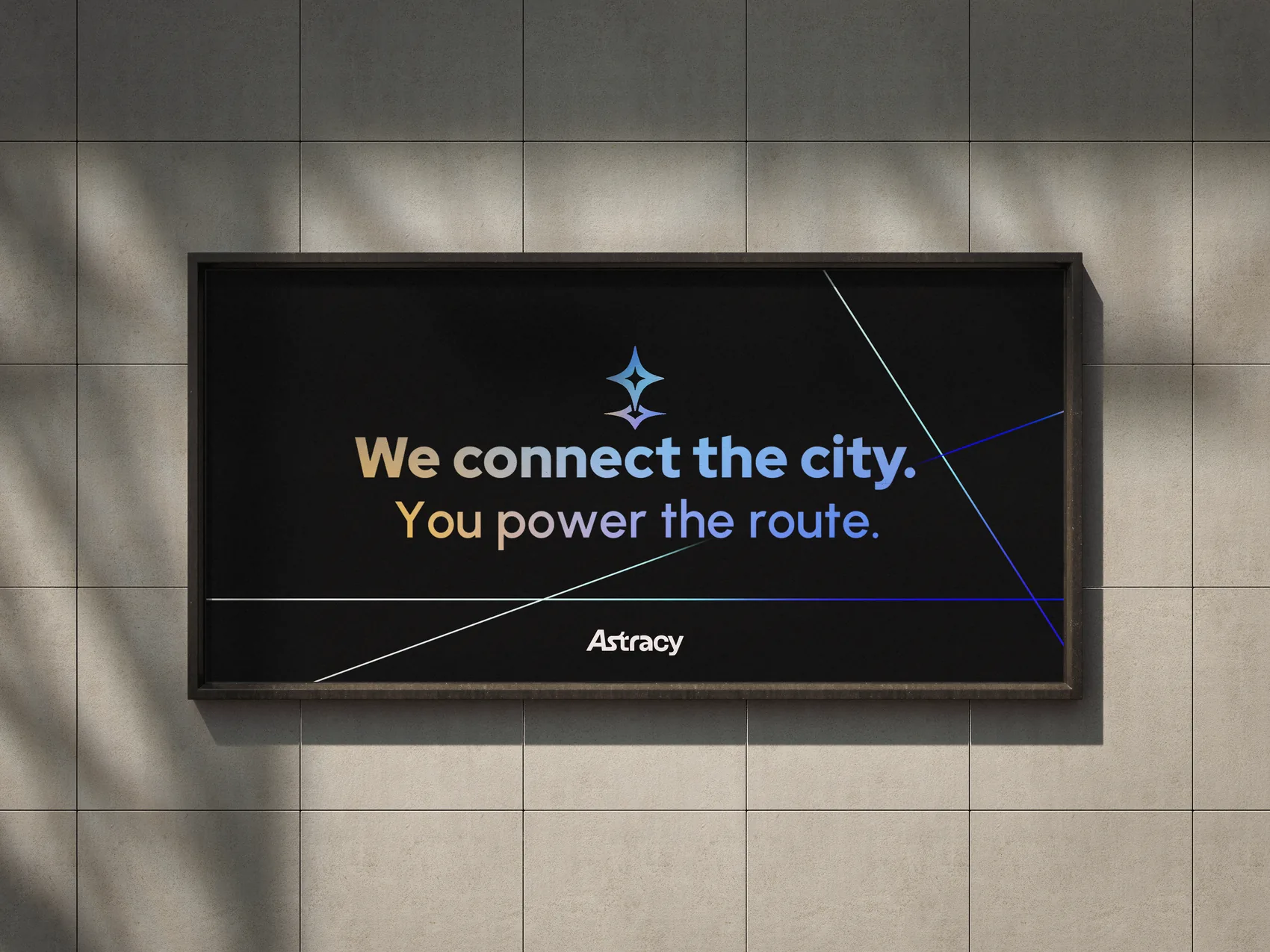 Astracy billboard mockup on a city building reading We connect the city, you power the route